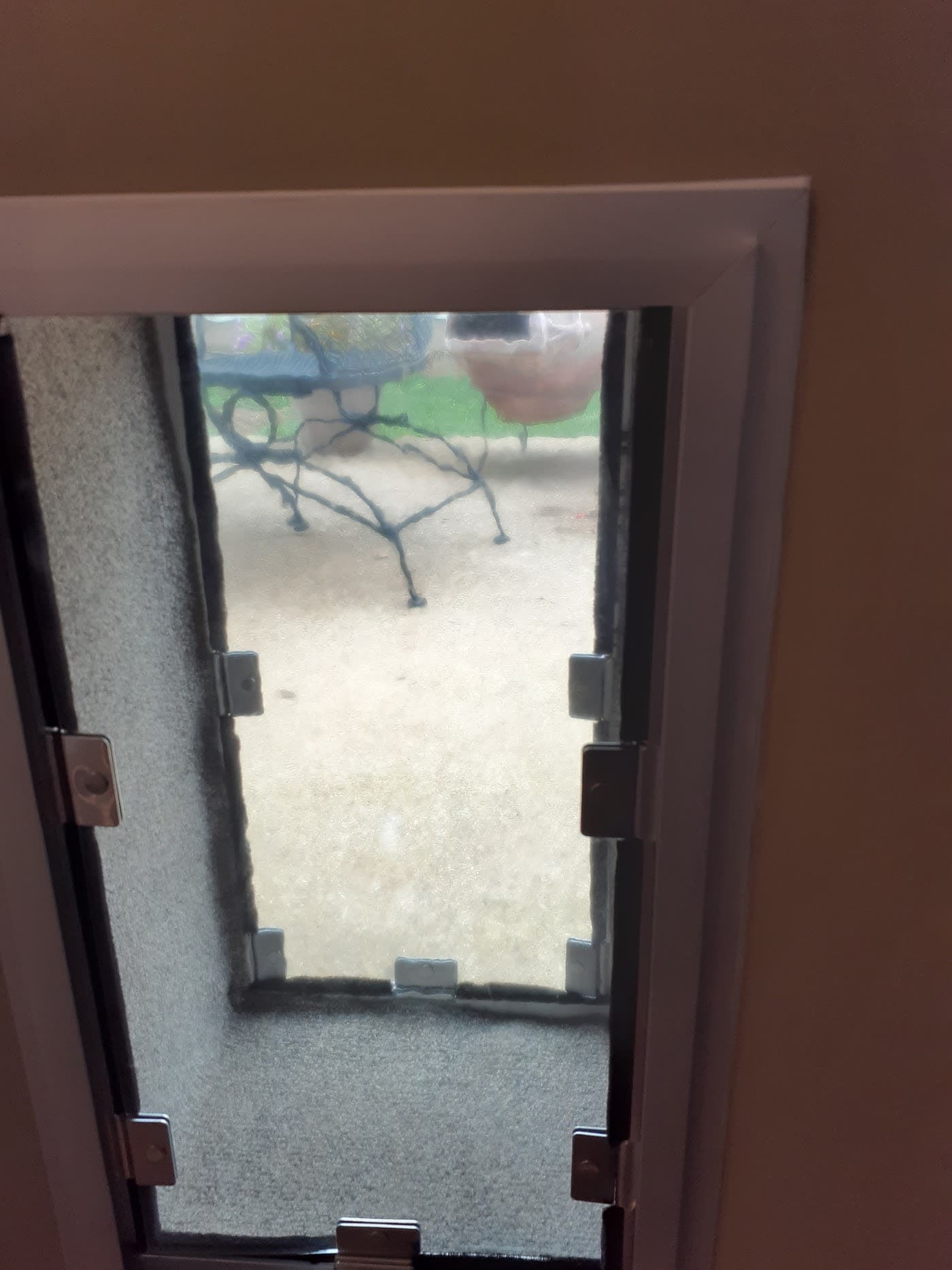 A pet door installed in a sliding glass door